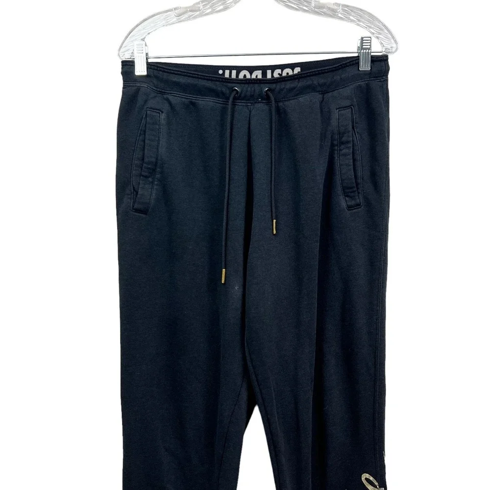 Nike Womens Jogger Pants Sportwear Drawstring Waist Metallic Logo Print Black M*